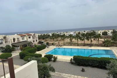 Image de penthouse with rooftop, 2 balcony ocean & mountain view pool beachfront Bbq wifi