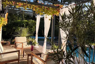 Image de Charmante maison proche Bordeaux - calme - 8 couchages - Piscine - cuisine d’ete
