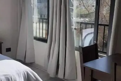 Image de Studio apartment, subway stations and Barrio Italia nearby. WiFi.