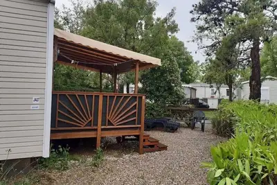 Image de Mobil-Home Le Jardin spacieux sur le camping 4 étoiles la Carabasse Vias plage.