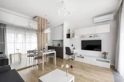 Image de ❣Studio with balcony in Mennica Residence❣❄with air conditioning❄