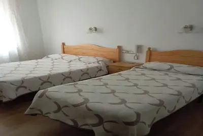 Image de Chambre double confortable avec salle de bain privée