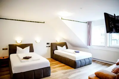Image de Comfortable and versatile room -perfect for relaxation, work and exchange