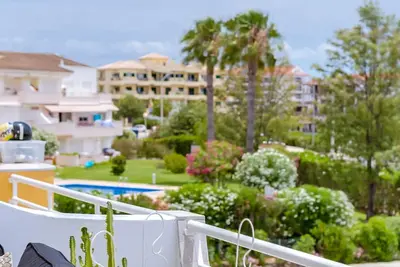 Image de Design Top Floor With Balcony & Pool by LovelyStay