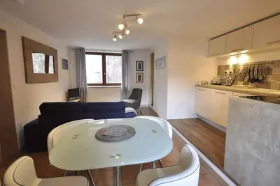 Image de Appartement deux chambres avec balcon ensoleillé, vue sur les montagnes, terrasse privée et Wi-Fi