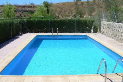 Image de Maison de campagne 'Cortijo El Paso' avec vue sur les montagnes, piscine privée et terrasse privée