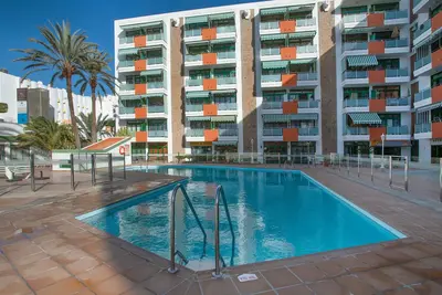 Image de Appartement de vacances 'Apartamento Yumbo Dunas' avec piscine partagée, terrasse privée et Wi-Fi