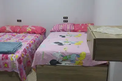 Image de Charming 2-bedroom apartment with Ac, WiFi, garden and swimming pool in Cairo