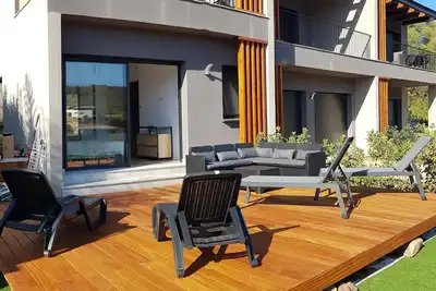 Image de Duplex neuf T3 terrasse et jardin proche plages et 5 mn commerces en voiture