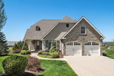 Luxurious 4-bedroom home with stunning sunsets with Fitness and Media rooms!