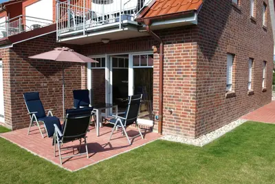 Image de Appartement 'Fischerweg - Fewo Nordseebrise' avec terrasse privée, jardin privé et Wi-Fi