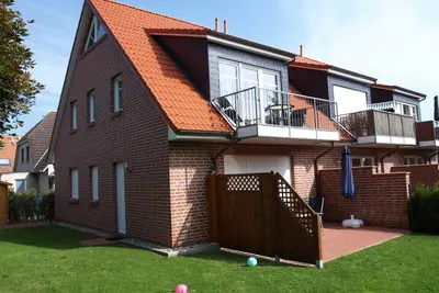 Image de Appartement 'Hattermannsweg - Fewo Nordseetraum' avec terrasse privée, jardin privé et Wi-Fi
