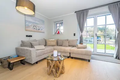 Image de Half of a house in Westerland with sauna and garden. Pets are very welcome.
