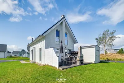Image de Huus Lee - infrared cabin, bathtub, fireplace, parking lot, terrace, beach chair