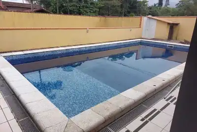 Image de House with swimming pool, barbecue and court, located one block from the sea.