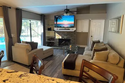 Charming 4 bdrm house in gated, exclusive neighborhood w\/ large heated pool.