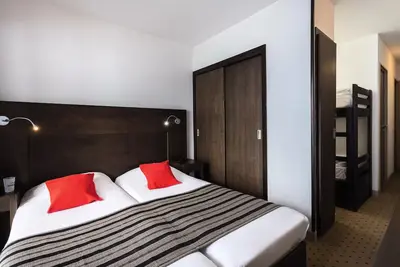 Image de Classic Zimmer 2 Erwachsene + 2 Kinder mit Balkon