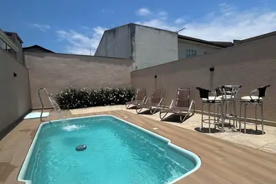 Image de House with pool and pool table.
