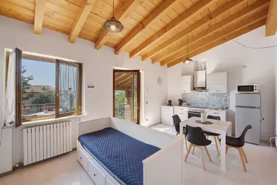 Image de Maison de vacances 'Appartamenti Villa Fiorito' avec vue sur lac, Wi-Fi et climatisation