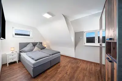 Image de Maison de vacances 'Schorsch's Ferienhaus' avec terrasse privée, jardin privé et Wi-Fi
