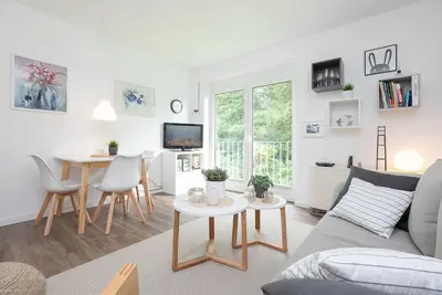 Image de Vacation apartment Kleines Glück in the apartment complex Wennseestraße