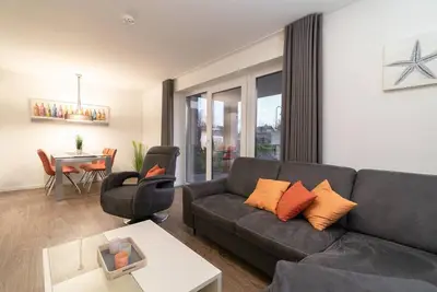 Image de Steife Brise vacation apartment with its own sauna in Kirschgarten 1 in Kellenhusen