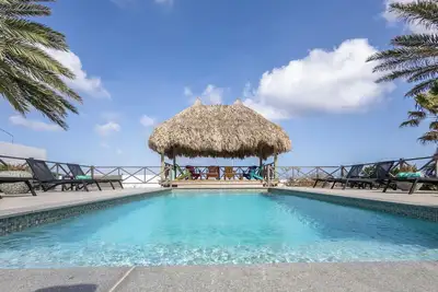 Image de Superb oceanfront villa, walking distance to the beach and stores of Jan Thiel!