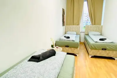 Image de Comfortable Private Room for 3p in a Shared Apt.