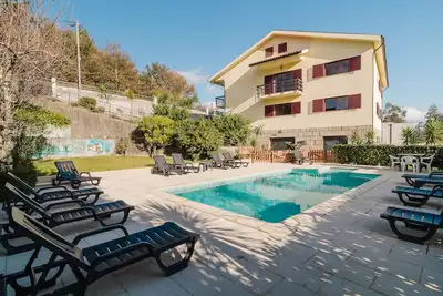 Image de Maison de vacances 'Alojamento Casa Da Pedra Verde' avec vue sur les montagnes