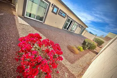 Image de 9-Bedroom 7 bath Phoenix home with Modern Amenities & Patio Access & Events