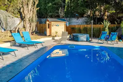 Image de Studio 'Soleil Et Palmiers' avec piscine partagée, Wi-Fi et climatisation