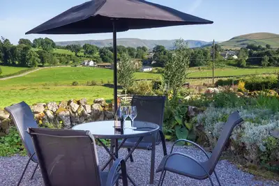 Image de Charming Lake District cottage with stunning views, parking & Ev charger.