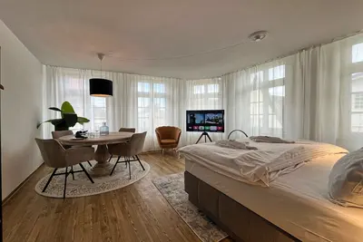 Image de Light-flooded apartment on the market square 66 sqm No. 3 #Cosiness Company 23