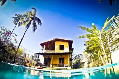 Image de Terrific 4-bedrooms beach house with Ac, WiFi, privacy with green area.
