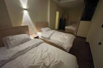 Image de Triple Room with Private Bathroom