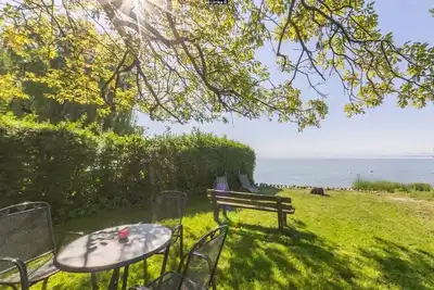 Image de The bright, cozy vacation home with spacious garden and private natural beach