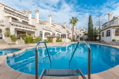 Image de Appartement 'Casa Reina Arriba Fewo Cabo Roig' avec piscine partagée, Wi-Fi et climatisation