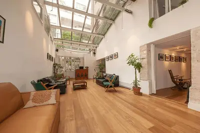 Image de A slice of Parisian History-A large unusual 200m2 loft with Natural light
