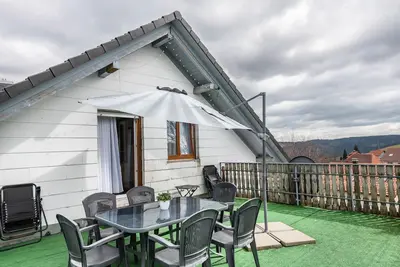 Image de Appartement 'Zur Sonnenterrasse' avec vue sur les montagnes, terrasse partagée et Wi-Fi