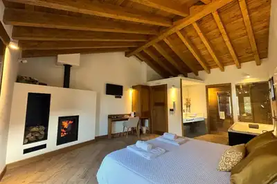 Image de Chambre 'La Mira Chimenea Y Terraza' avec vue sur les montagnes, terrasse privée et Wi-Fi