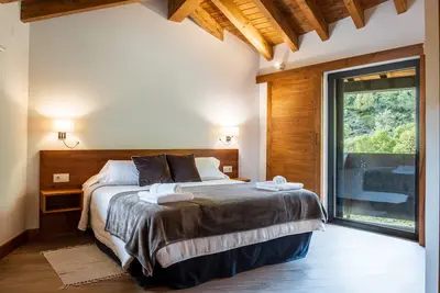 Image de Chambre 'Junior Suite Almanzor' avec vue sur les montagnes, terrasse privée et Wi-Fi