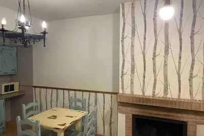 Image de Appartement 'Carrasco' avec vue sur les montagnes, piscine partagée et Wi-Fi