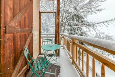 Image de Chalet 'Le Flocon Grand 4 Étoiles' avec vue sur la montagne, terrasse privée et Wi-Fi