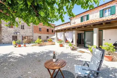 Image de Maison de vacances avec terrasse et climatisation