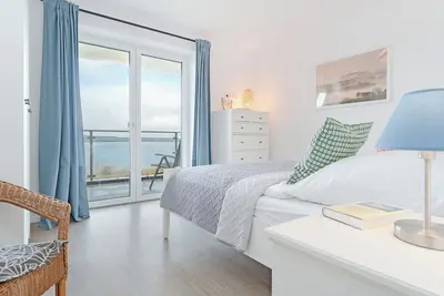 Image de Vacation apartment Maräne in Haus Seeblick with balcony and lake view in Bosau