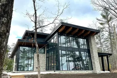 Image de Luxury 5-bedroom cottage in tranquil Muskoka with WiFi, Ac, fitness room