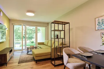 Image de Design apartment for couples or families with a view of the countryside and garden