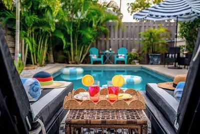 Image de Heated Pool, Game Room & Fire Pit, 15min to Beach.