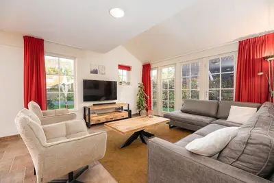 Image de This comfortable luxury villa is located on vacation park Buitengoed Het Lageveld.
