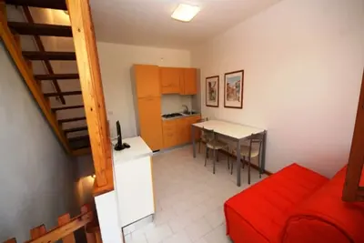 Image de Détendez-vous dans notre appartement avec jardin à Rosolina